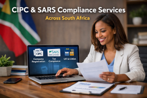South African business professional reviewing documents on a laptop showing CIPC, SARS, UIF and COIDA compliance services.